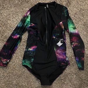 Torrid rash guard swim suit. New with tags and seal.